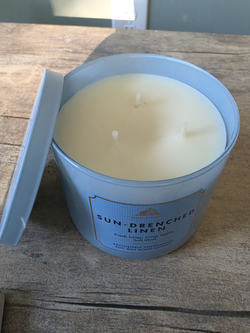 White Barn Sun-Drenched Linen Light Blue Candle with Gold Accents - Picture 2 of 2
